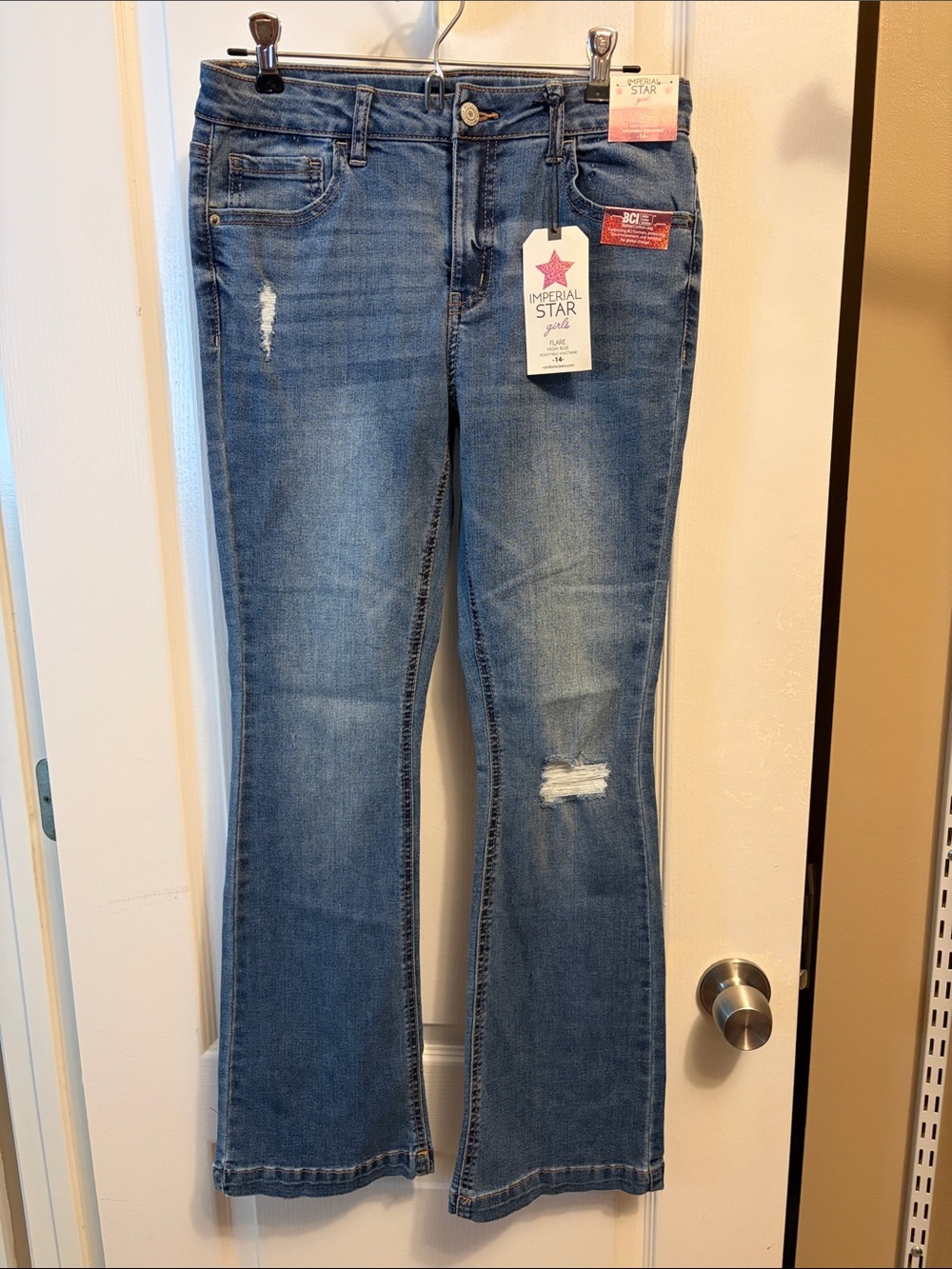 Imperial Star Women’s Light Blue Flared Jeans with Distressing